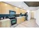 Modern kitchen offering stainless steel appliances and sleek, light-colored cabinets at 3324 Peachtree Ne Rd # 1503, Atlanta, GA 30326