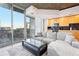 The living room boasts floor-to-ceiling windows with city views, hardwood floors, and an open layout at 3324 Peachtree Ne Rd # 1503, Atlanta, GA 30326