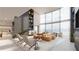 An elegant living area with high ceilings, a fireplace, city views, and modern decor at 3324 Peachtree Ne Rd # 1503, Atlanta, GA 30326