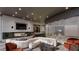 Stylish lounge with cozy fireplace, curved sofa, and contemporary design elements at 3324 Peachtree Ne Rd # 1503, Atlanta, GA 30326