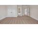 Spacious bedroom with carpet, white trim, and ensuite bathroom at 125 Drummond Pl, Covington, GA 30014