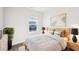 Cozy bedroom featuring neutral decor, natural light, and a peaceful ambiance at 434 Herring Dr, Acworth, GA 30102