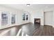 Living room featuring a fireplace, natural light, and access to the outdoor deck at 434 Herring Dr, Acworth, GA 30102