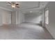 Expansive bedroom with natural light and neutral carpet flooring at 157 Haverling Pass, Hampton, GA 30228