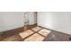 Bright bedroom with hardwood floors, freshly painted walls, and natural light at 318 Stewart Nw Ave, Marietta, GA 30064