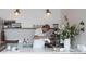 Barista preparing a drink behind the counter of a modern coffee shop at 318 Stewart Nw Ave, Marietta, GA 30064