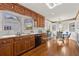 Spacious kitchen with wood cabinets, white countertops, and views into the breakfast nook at 318 Stewart Nw Ave, Marietta, GA 30064