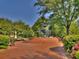 Scenic town square with a brick fountain, benches, and lush landscaping at 318 Stewart Nw Ave, Marietta, GA 30064