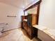 Bathroom with a vanity and sink, mirror, and neutral wall color at 1409 Oakridge Cir, Decatur, GA 30033