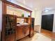 Elegant bathroom vanity with a vessel sink, hardwood cabinets and granite floors at 1409 Oakridge Cir, Decatur, GA 30033