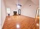 Bright living room with hardwood floors, fireplace, and a modern ceiling fan at 1409 Oakridge Cir, Decatur, GA 30033