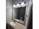 Bathroom featuring a sink, vanity, mirror, and lighting at 926 Westland Dr, Marietta, GA 30064