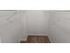 Neutral walk-in closet with white walls, brown carpet and wire racks at 926 Westland Dr, Marietta, GA 30064