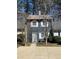 Charming townhome featuring a gray exterior, white trim, and a well-maintained front yard at 926 Westland Dr, Marietta, GA 30064