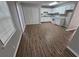 Updated kitchen and eating area with white cabinets, new appliances, and modern flooring at 926 Westland Dr, Marietta, GA 30064