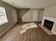 Open living area with fireplace and new wood flooring at 926 Westland Dr, Marietta, GA 30064