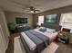 Well-furnished main bedroom featuring a bed, dresser, TV, and stylish decor at 926 Westland Dr, Marietta, GA 30064