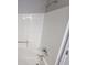 Close-up of a clean, white shower stall with a showerhead and faucet at 926 Westland Dr, Marietta, GA 30064