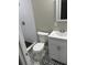 Modern bathroom with white vanity and patterned floor at 5380 Saint Lo Ln, Atlanta, GA 30349