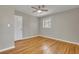 Nice bedroom with hardwood floors and ample natural light at 5380 Saint Lo Ln, Atlanta, GA 30349