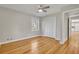 Comfortable bedroom featuring closet and hardwood floors at 5380 Saint Lo Ln, Atlanta, GA 30349