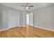 Bright bedroom features closet and access to hallway at 5380 Saint Lo Ln, Atlanta, GA 30349