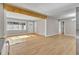 Inviting living room featuring wood floors and wooden beam accent at 5380 Saint Lo Ln, Atlanta, GA 30349