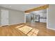 Open-concept living room features hardwood floors at 5380 Saint Lo Ln, Atlanta, GA 30349