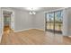 Sun-filled living room features sliding door to outdoor space at 5380 Saint Lo Ln, Atlanta, GA 30349