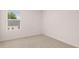 Bedroom featuring a window at 1009 Cades Walk, Lawrenceville, GA 30045
