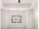 Bright bedroom featuring a ceiling fan and a window with a view at 1009 Cades Walk, Lawrenceville, GA 30045