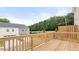 Wooden deck overlooking backyard and neighborhood with street view at 1009 Cades Walk, Lawrenceville, GA 30045