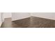 Open floor plan featuring sleek wood flooring and neutral wall color at 1009 Cades Walk, Lawrenceville, GA 30045