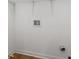 Basement featuring white walls, concrete floor, and utility hookups at 1835 W Taylor Ave, East Point, GA 30344
