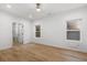 Open bedroom with wood floors, and natural light at 1835 W Taylor Ave, East Point, GA 30344