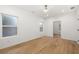 Sunny bedroom with wood floors, and bright natural light at 1835 W Taylor Ave, East Point, GA 30344