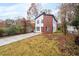 Stylish two-story home with eye-catching siding and a spacious front yard in a suburban setting at 1835 W Taylor Ave, East Point, GA 30344
