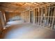 Large unfinished basement with exposed framing and utilities ready for customization at 101 Azalea Dr, Villa Rica, GA 30180