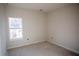 Unfinished bedroom with a bright window offering natural light at 101 Azalea Dr, Villa Rica, GA 30180