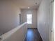Upstairs hallway with vinyl wood flooring and natural light at 101 Azalea Dr, Villa Rica, GA 30180