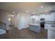 Open kitchen layout featuring an island, stainless steel appliances, and sleek cabinetry at 101 Azalea Dr, Villa Rica, GA 30180