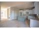 Bright kitchen with white cabinets, granite countertops, and island, ready for personalization at 101 Azalea Dr, Villa Rica, GA 30180