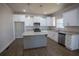 Modern kitchen with stainless steel appliances, white cabinets, and granite countertops at 101 Azalea Dr, Villa Rica, GA 30180