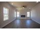 Spacious living room featuring a modern fireplace, recessed lighting, and lots of natural light at 101 Azalea Dr, Villa Rica, GA 30180