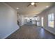 Bright and open living room connected to kitchen with stairs and backyard deck access at 101 Azalea Dr, Villa Rica, GA 30180
