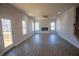 Bright and open living room features a modern fireplace and access to a backyard deck at 101 Azalea Dr, Villa Rica, GA 30180
