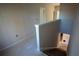 Stairway leading downstairs with carpeted steps and white trim at 101 Azalea Dr, Villa Rica, GA 30180