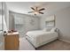 Cozy bedroom with a queen-size bed and ceiling fan at 162 Alday Ln, Marietta, GA 30060