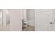Bathroom features a full tub and a modern vanity at 989 Cades Walk, Lawrenceville, GA 30045