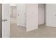 Spacious bedroom with neutral carpet and white doors at 989 Cades Walk, Lawrenceville, GA 30045